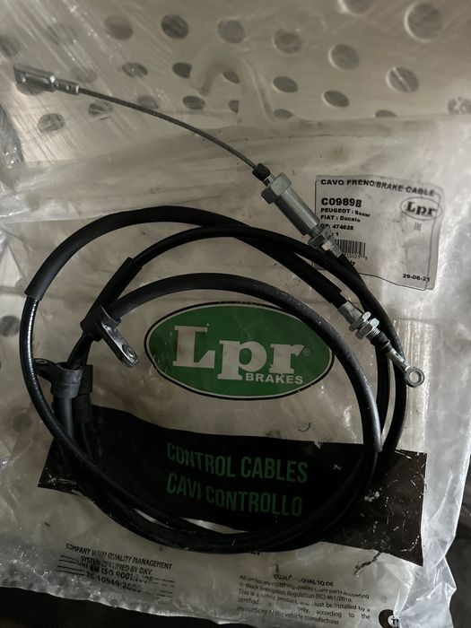 Тросс ручного тормоза, ролик натяжителя VW, амортизатор, часть тубуса,