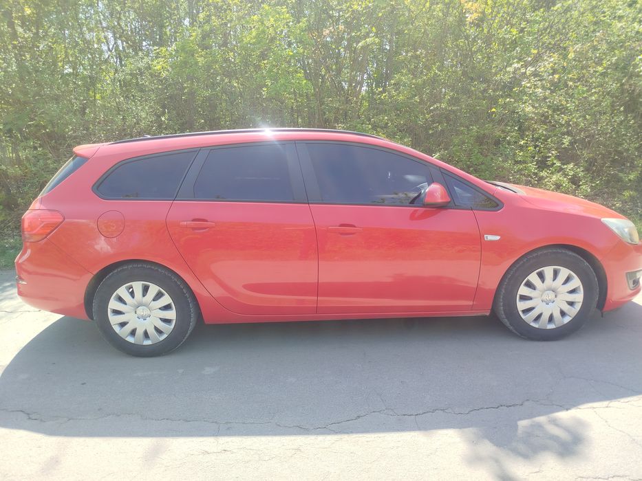 Опель Astra j sports tourer 1.3 cdti