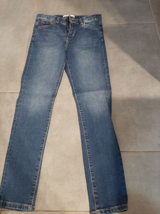 Jeansy dla dziewczynki granatowe  rurki  Reserved 134 nowe