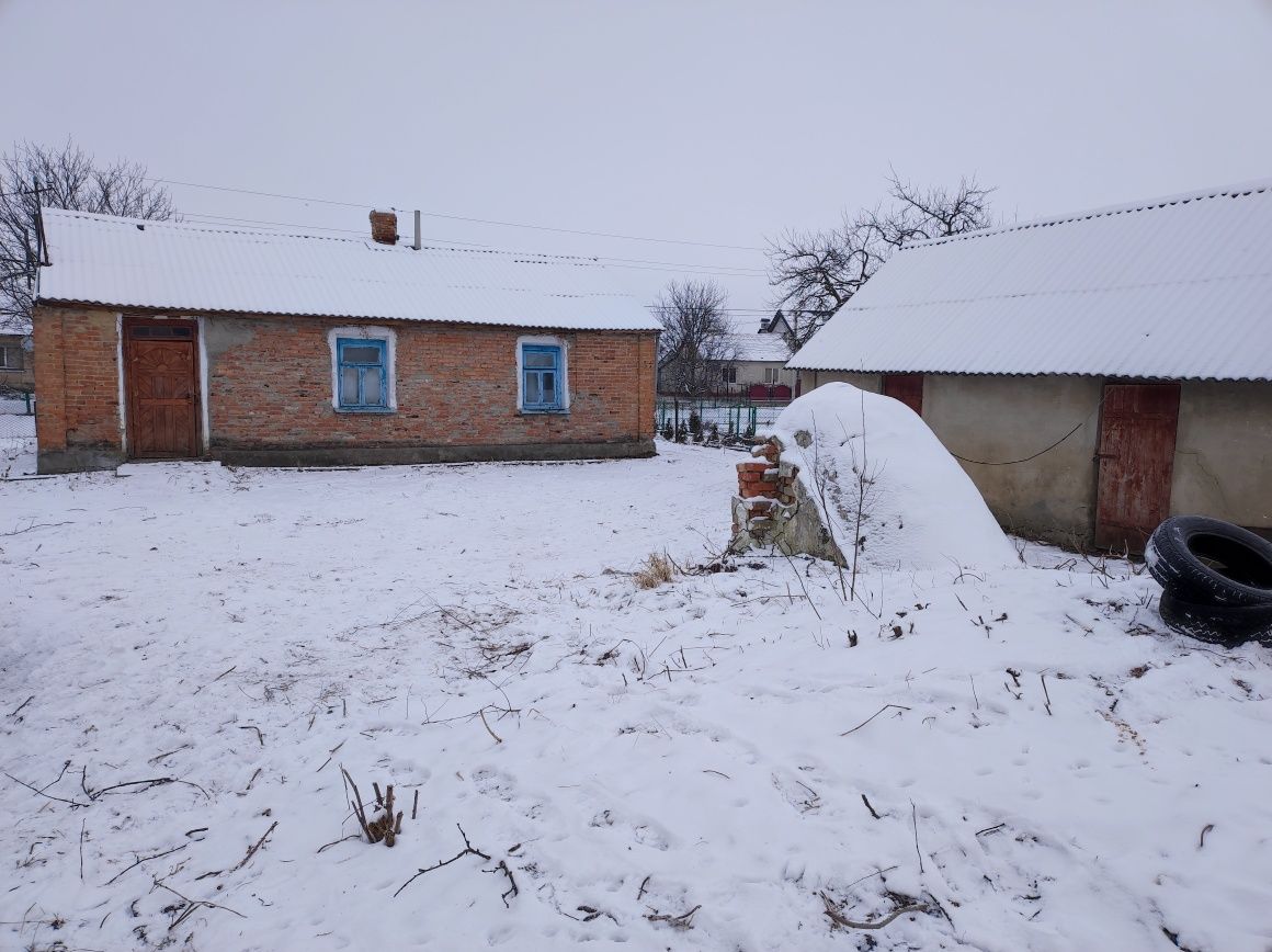 Продається земельна ділянка з житловим будинком