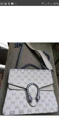 Жіноча оригінальна сумочка Gucci.