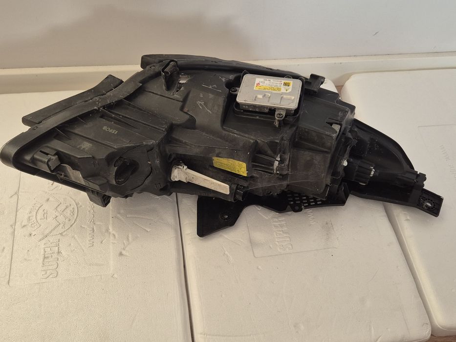 Kia Optima reflektor lewy xenon