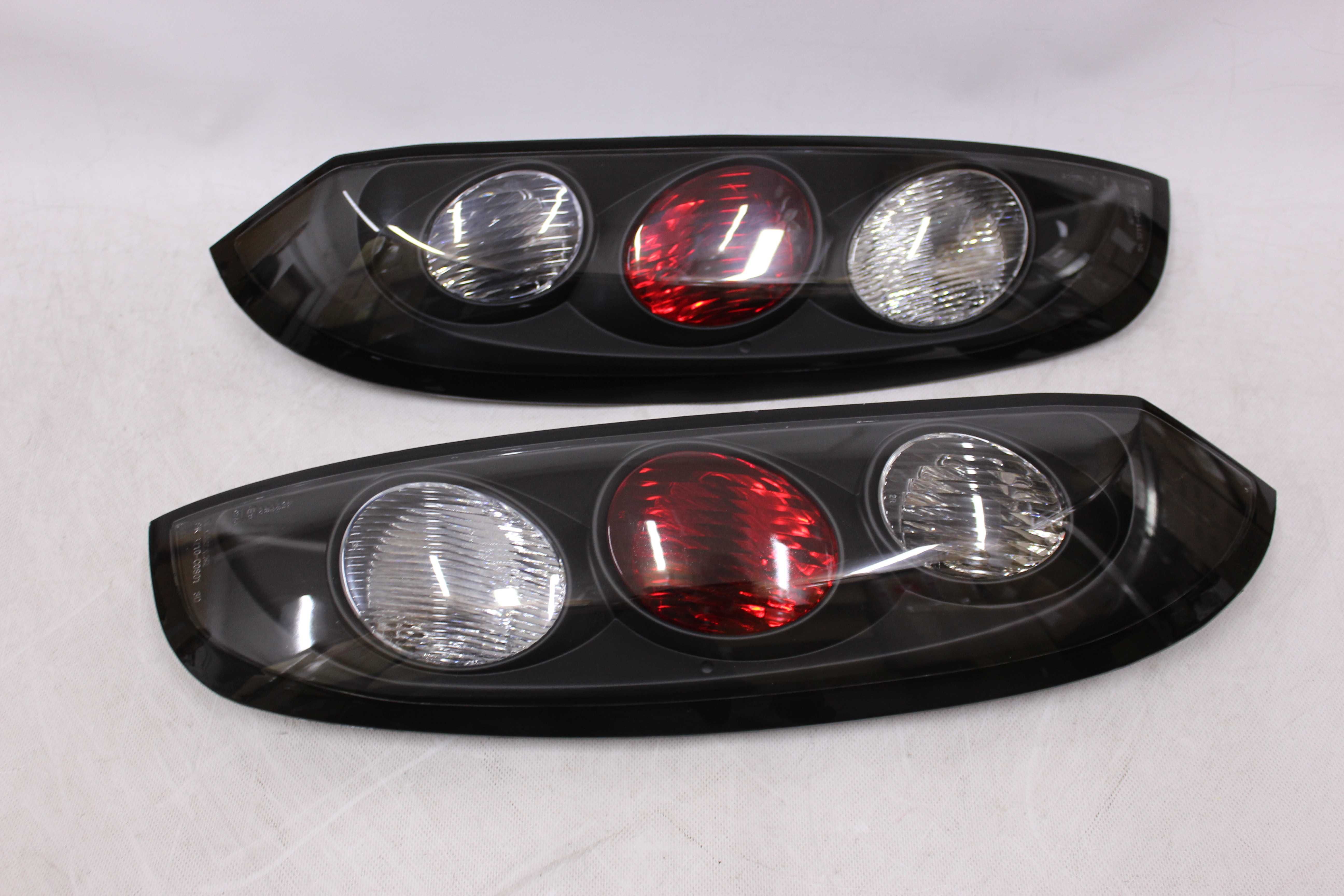 Lampy światła tył tylne OPEL CORSA C III 00-06 TUNING Black SMOKE NOWE