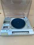 Gira discos Sharp stereo music center Sg-270