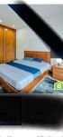 Quarto casal com 2 mesinhas