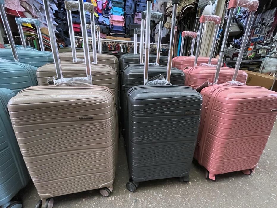 Чемоданы ткань и полипропилен