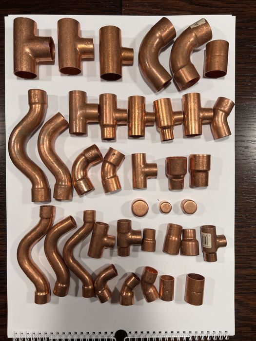 Kształtki miedziane, mosiężne, zawory, rozety PCV