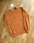 Nowy ceglasty sweter z pomponami na jesien ShopBazzar