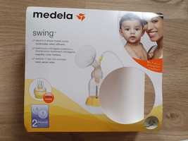 Laktator dwufazowy Medela Swing +  butelka Medela Calma 250 ml