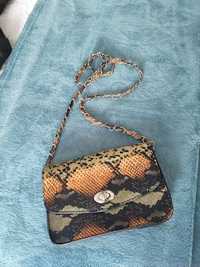 Mala Clutch Nova super trendy