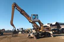 Koparka przeładunkowa Liebherr A934C. Żuraw. Chwytak. Wyburzenia