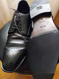 Sapatos clássicos de homen