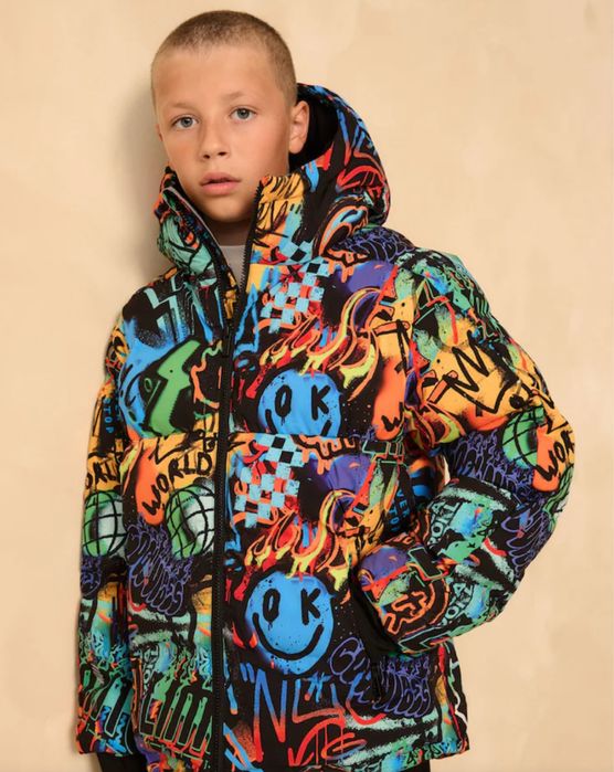 Яскрава зимова куртка Next в наявності