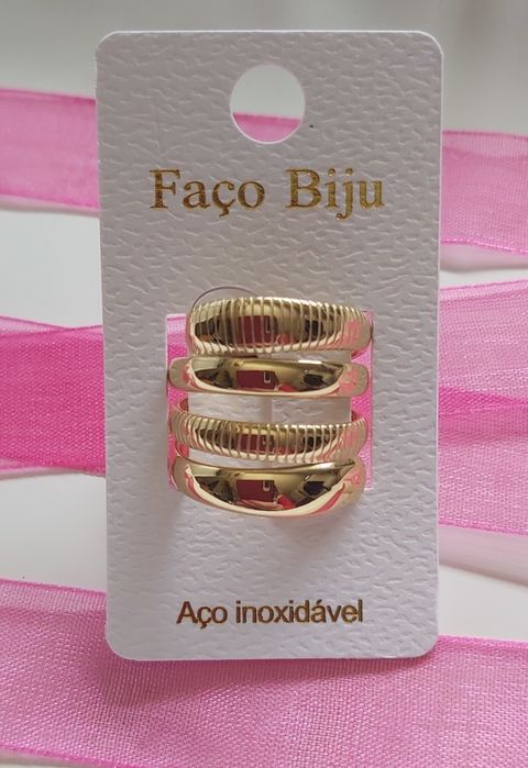 Anéis, em aço, dourado ou prateado. Ajustáveis