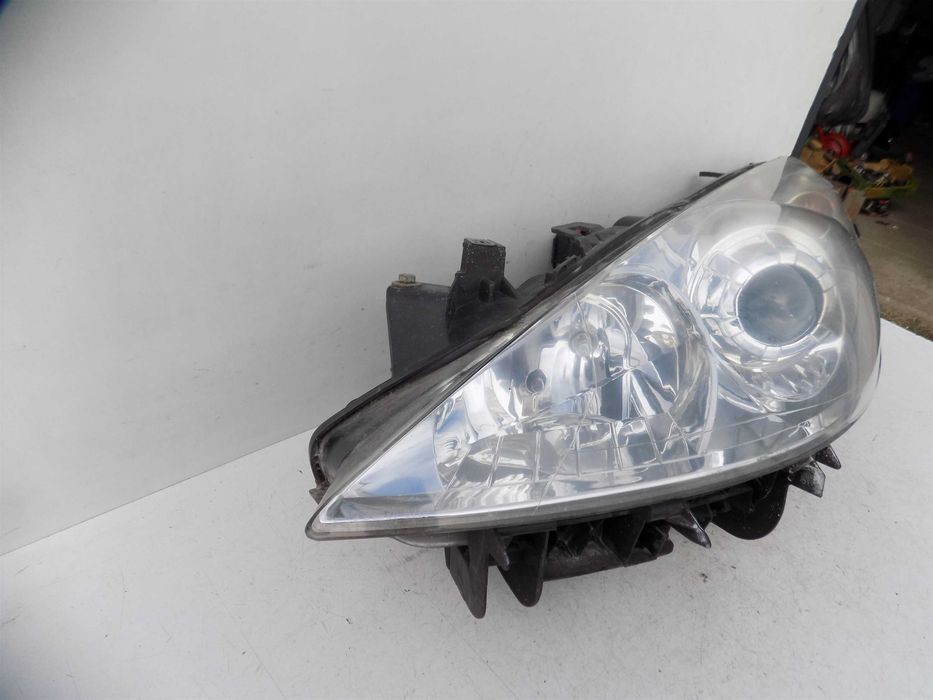Reflektor lampa przód lewa Peugeot 307 lift 05-08 Europa soczewka