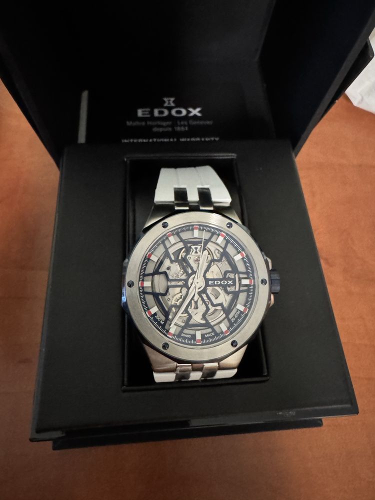 Edox Delfin Mecano nowy, automat, szafir, skeleton