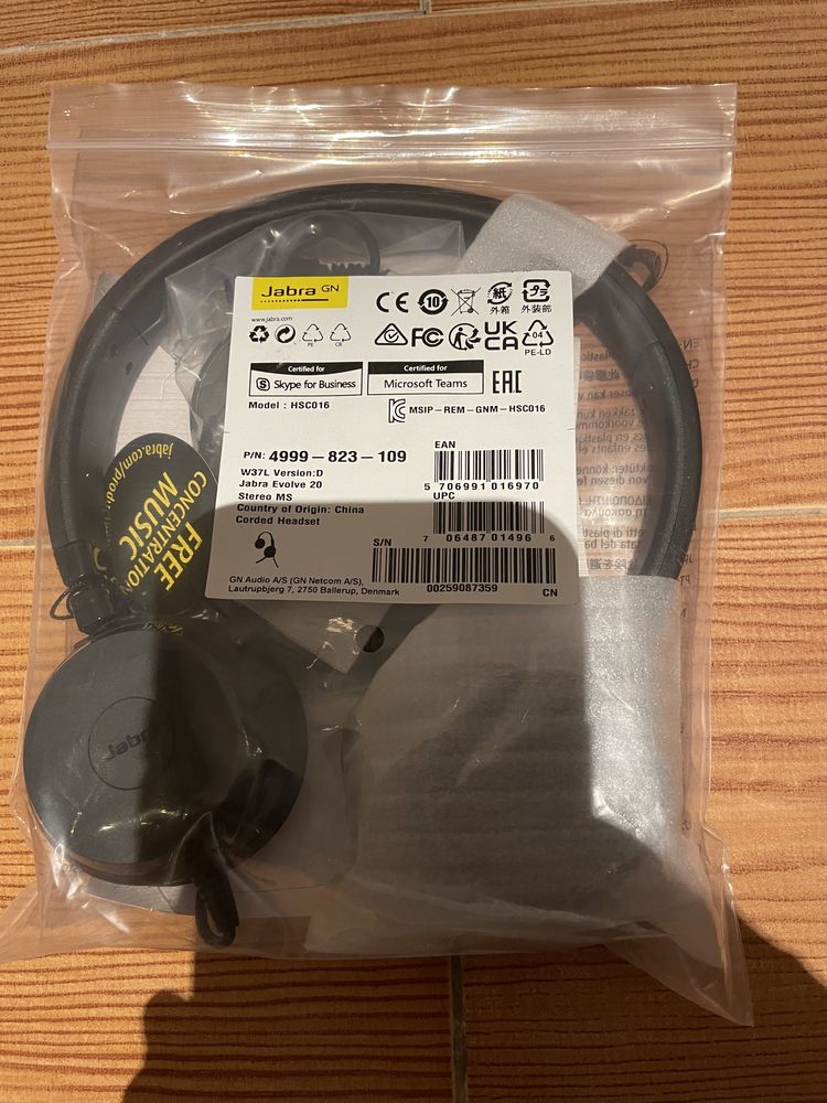 Auriculares e base de conferências Jabra