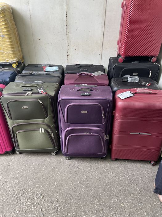 Чемоданы ткань и полипропилен
