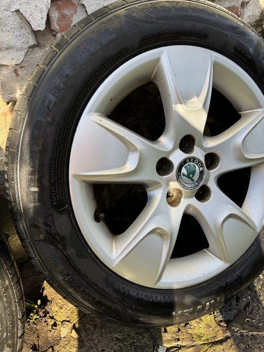 Комплект резини з титановими дисками