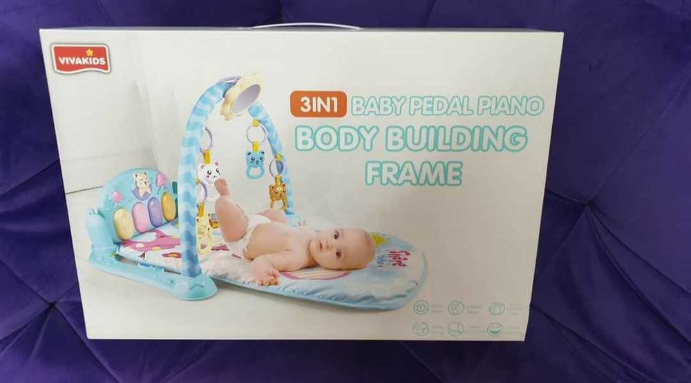 Розвивальний музичний коврик-піаніно.