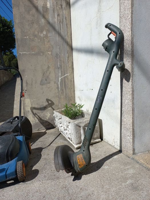 Máquinas de cortar relva