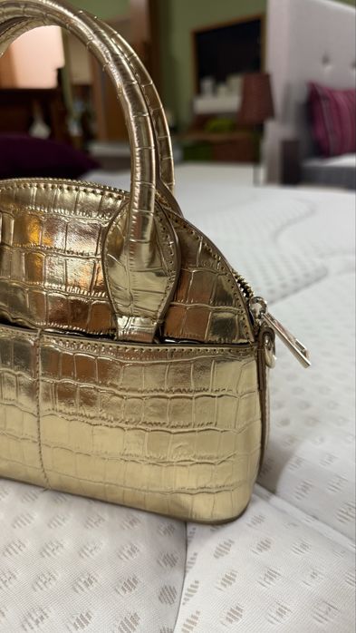 Mala da zara, dourada