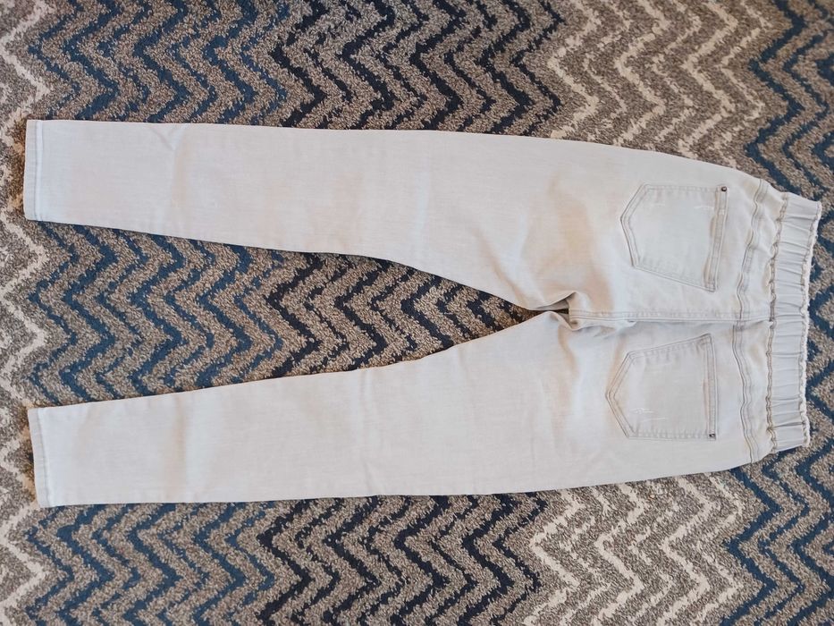 Szare spodnie dżinsowe dżinsy z dziurami na kolanach XS 152/158