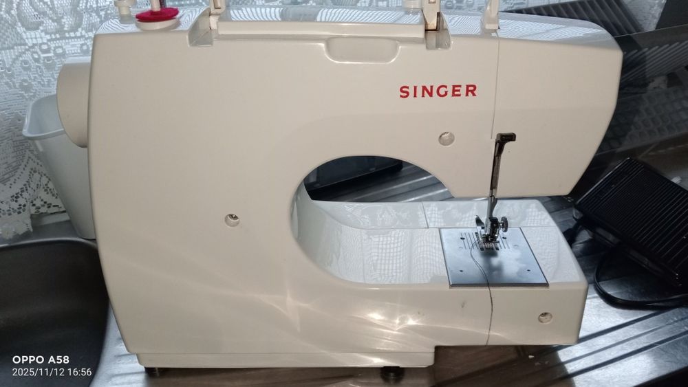 Maquina de costura Singer
