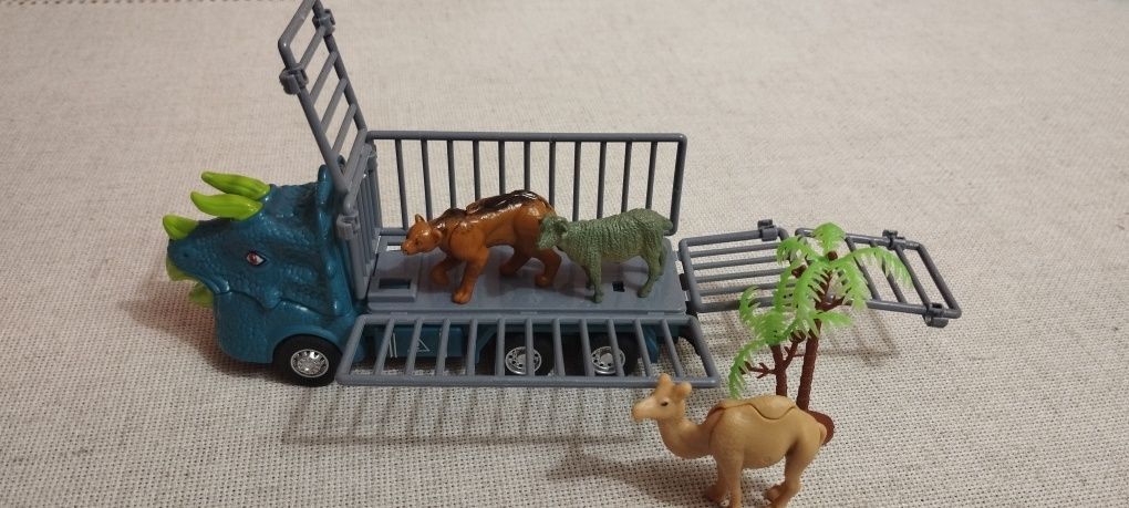 Машинка динозавр