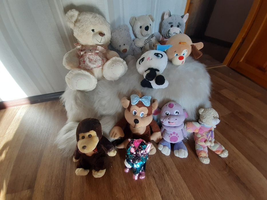 Продам детскую мягкую игрушку.поет песни.