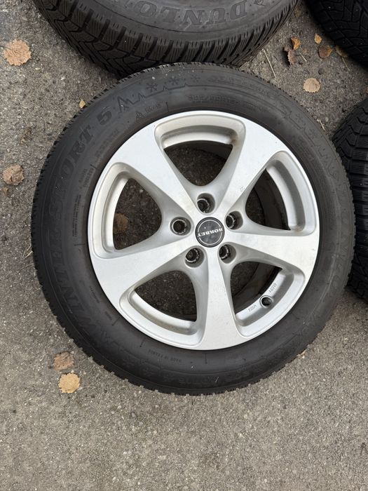 Felgi aluminiowe 5x105 z oponami zimowymi 205/60R16 Opel Astra J ET40