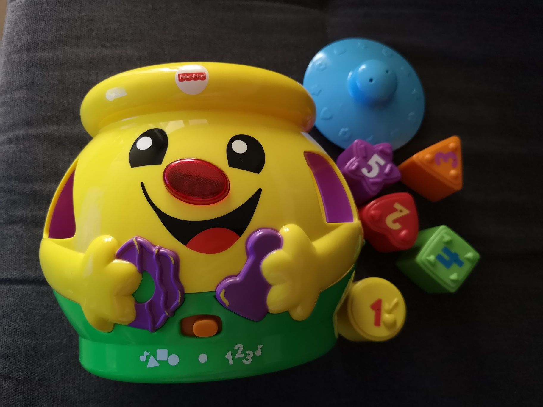 Garnuszek na klocuszek Fisher Price