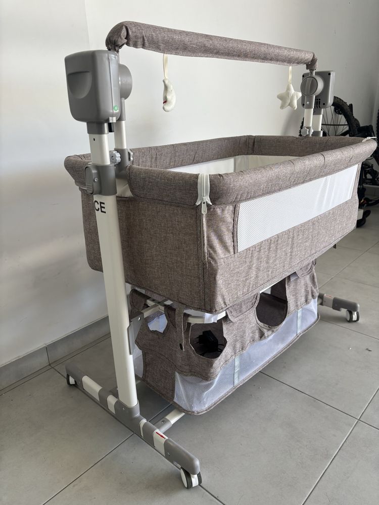 Cama de bebé eletrónica