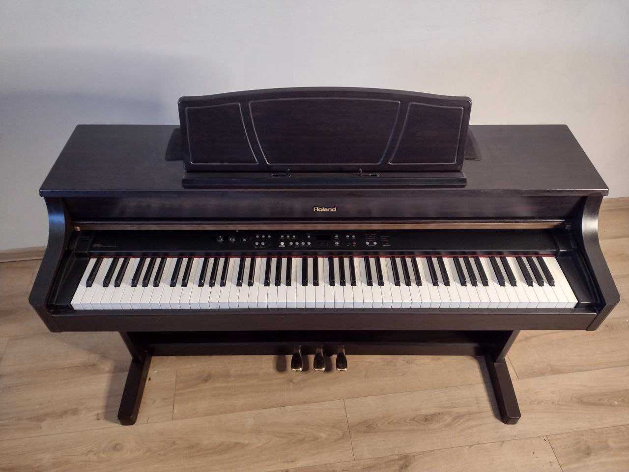 Pianino cyfrowe Roland HP-107e używane brąz mahoń stan bardzo dobry