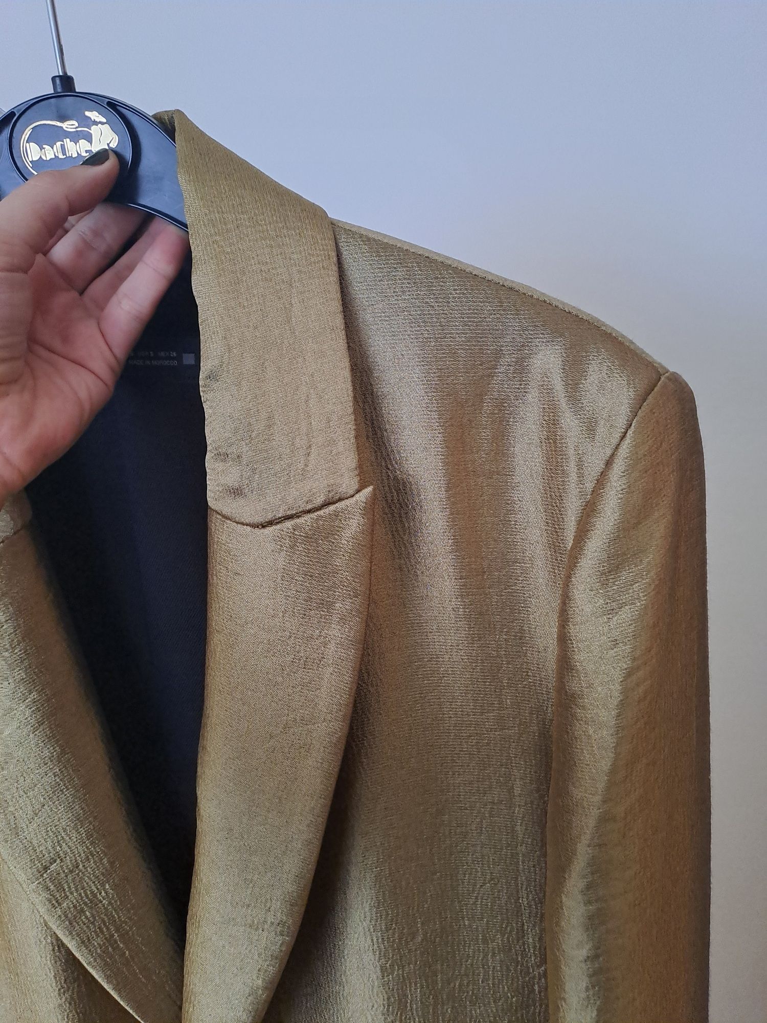 Blaser dourado Zara