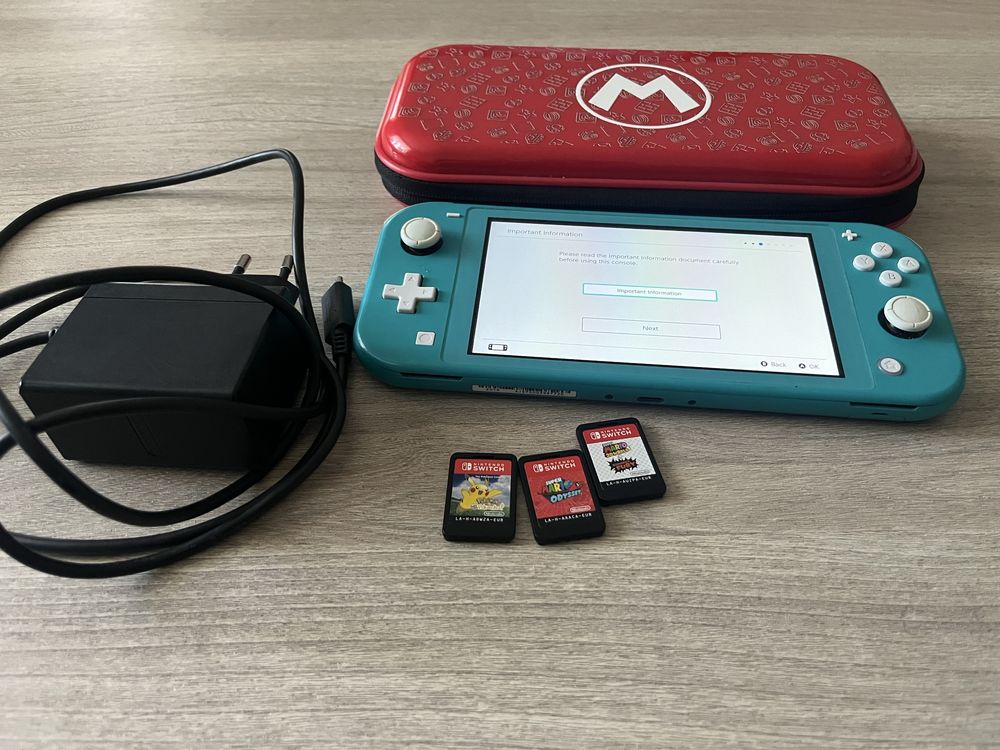 Nintendo Switch Lite + 3 gry