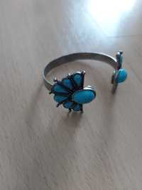 Sztywna srebrna bransoleta z niebieskimi zdobieniami, H&M