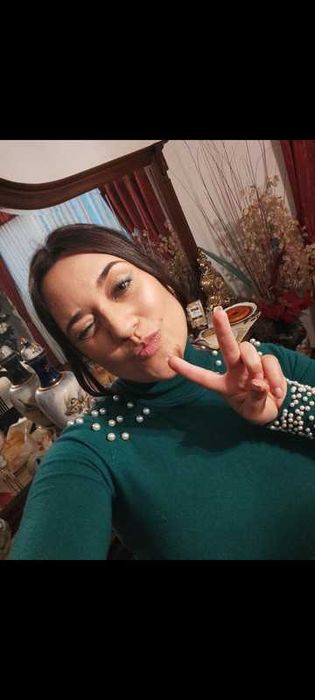 Vestido verde com pérolas