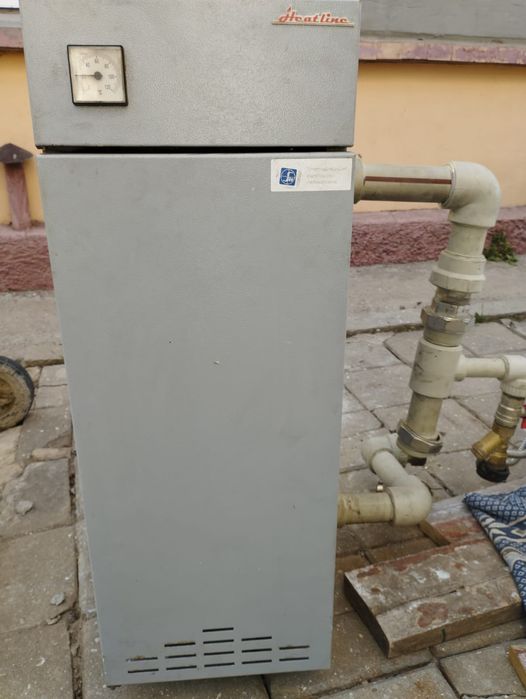 Продам котел напольный дымоходный б/у.