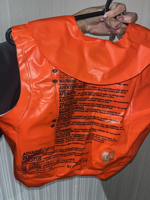 Надувной спасательный жилет