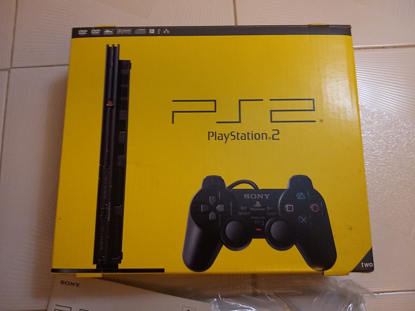 PlayStation 2 Slim - Como Nova