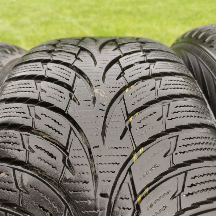 Koła zimowe 5x100 185/60/15 alufelgi czarne Dezent opon Nokian VW polo