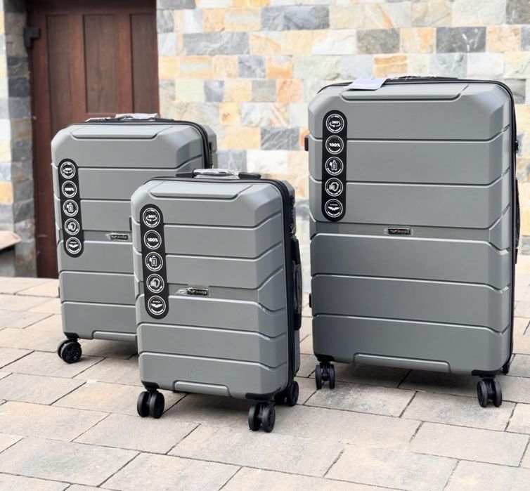 Дорожний чемодан валіза Полипропилен Нові wings на 8 колес 181 модель