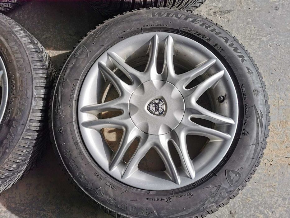 Felgi aluminiowe z oponami wielosezonowymi Lancia Fiat 4x98 15 cali 6j