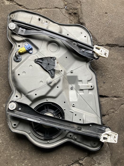 Skoda Octavia II - mechanizm podnoszenia szyby przód lewy