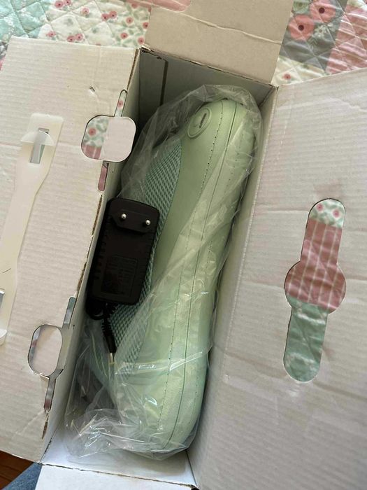 almofada de massagens nova