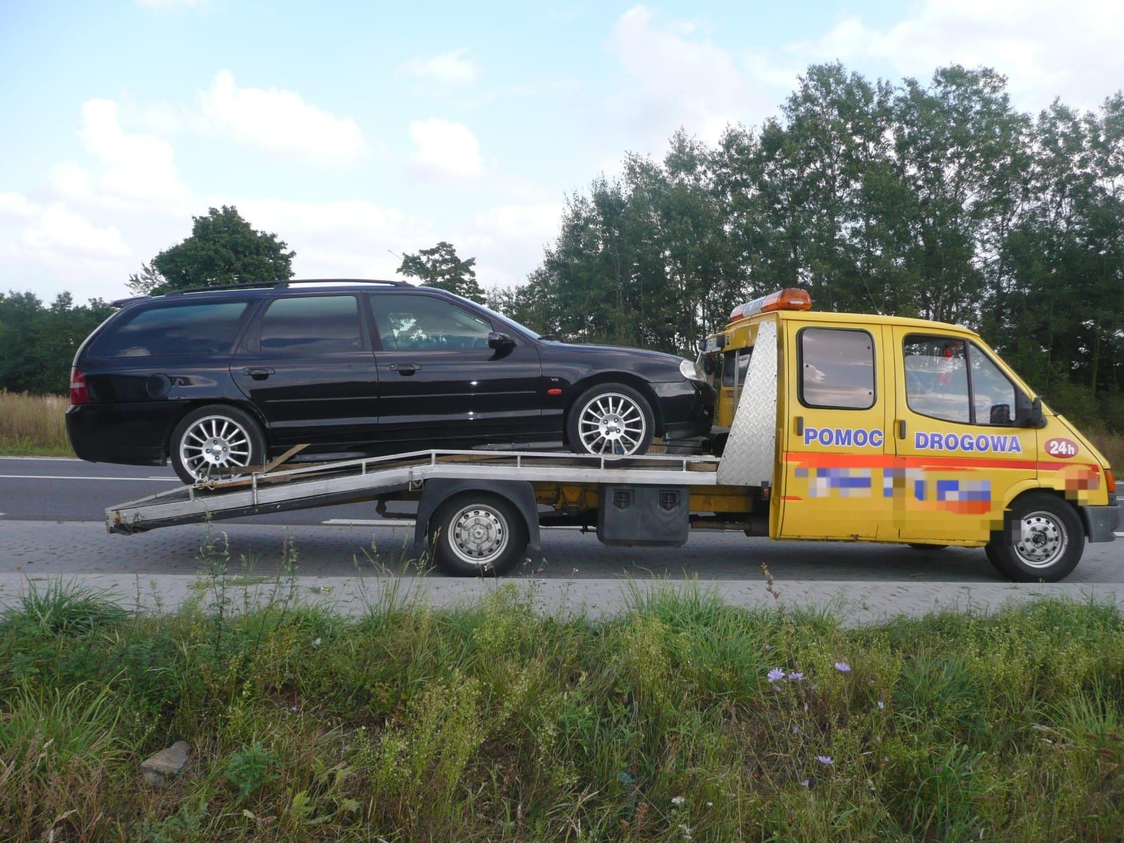 Najtańsza laweta pomoc drogowa 24H holowanie autopomoc transport