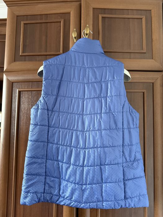 Жіноча синя жилетка