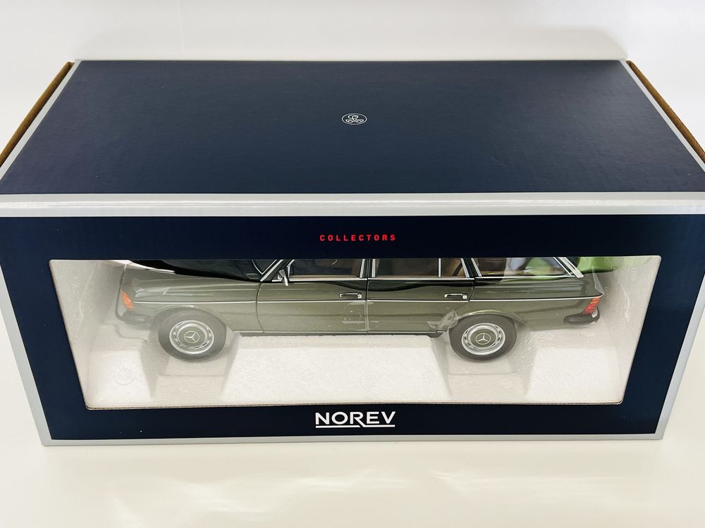 Mercedes 200T W123 kombi „beczka” zielony metalli 1/18 norev