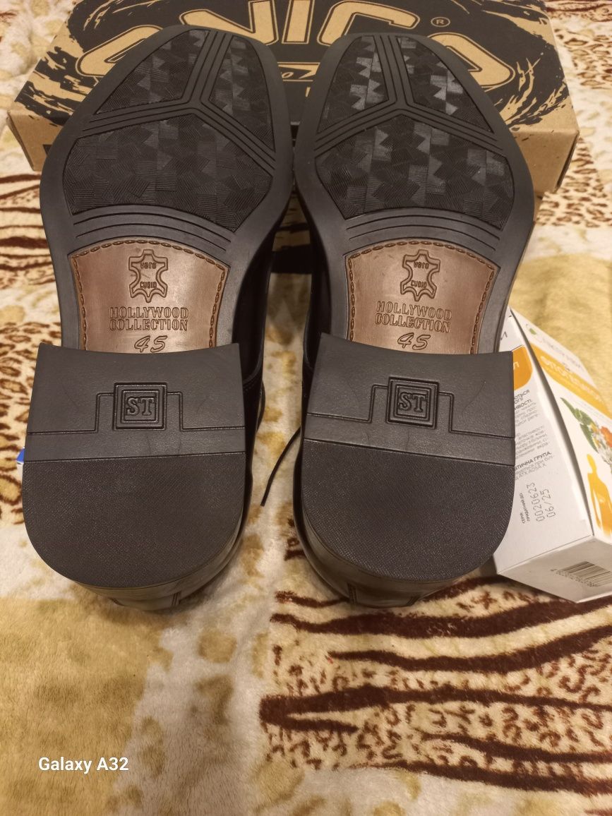 Продам новые кожаные мужские туфли на шнурках.Ц.1499 грн./пара.